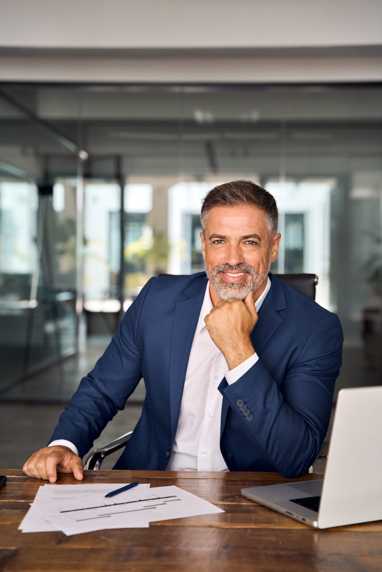 Vertical,Portrait,Of,Mature,Indian,Or,Latin,Business,Man,Ceo Vertical,portrait,of,mature,indian,or,latin,business,man,ceo