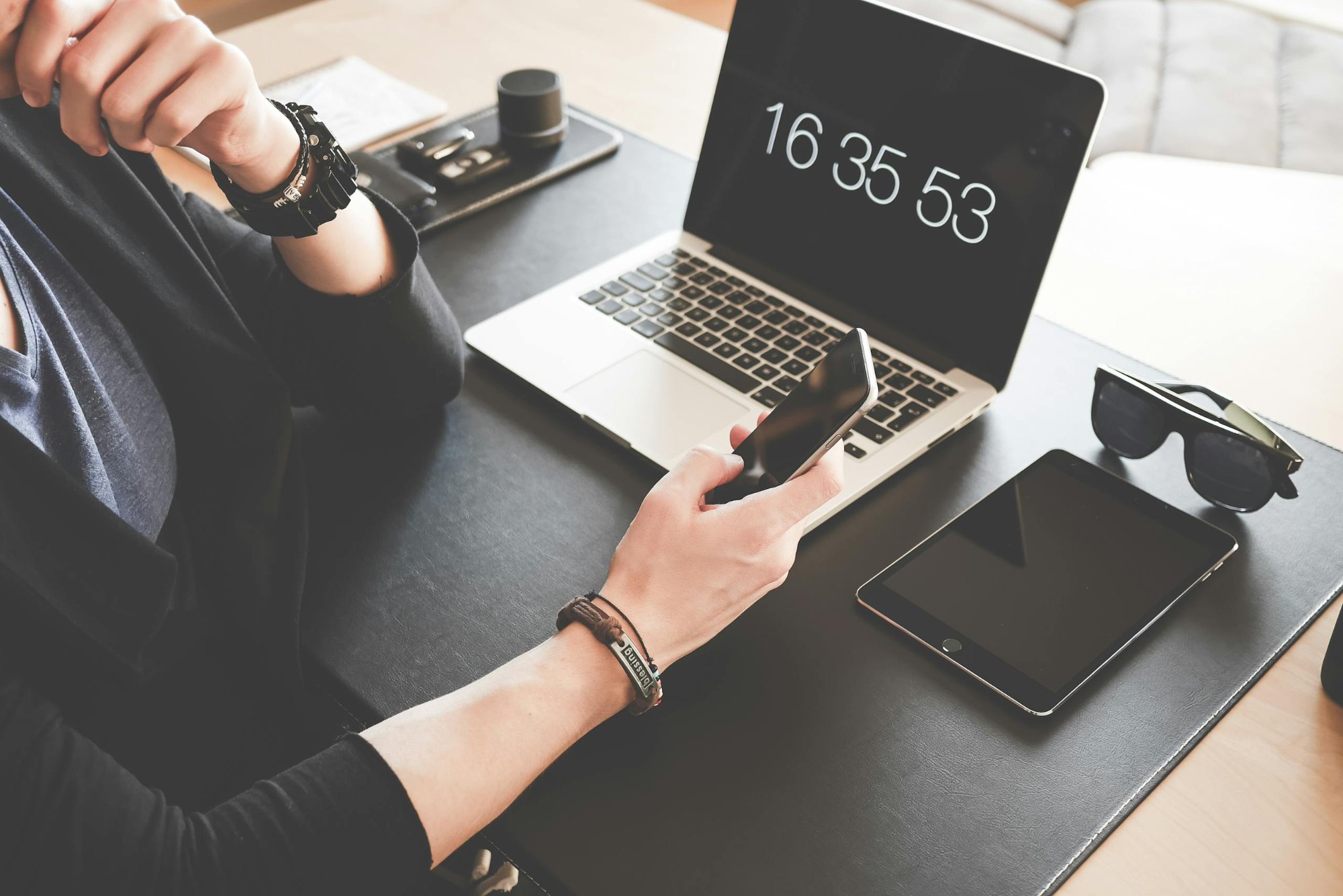 A Modern Workspace Featuring A Laptop Smartphone Tablet And Sunglasses Illustrating Digital Connectivity. 196656 Scaled